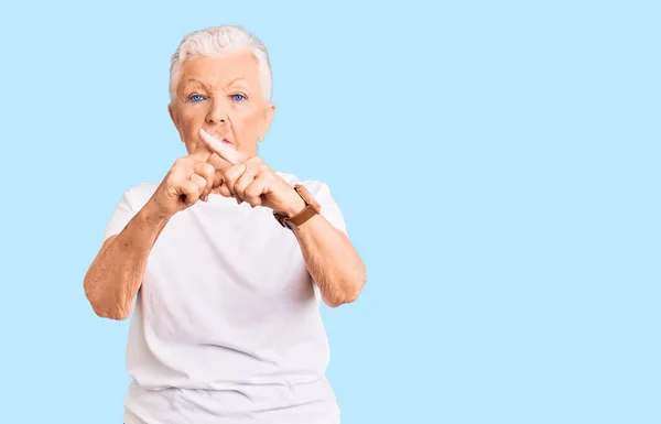 Senior Beautiful Woman Blue Eyes Grey Hair Wearing Casual White — Zdjęcie stockowe