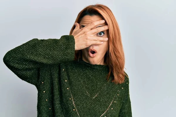 Hispanic Young Woman Wearing Casual Winter Sweater Peeking Shock Covering — Stock Photo, Image
