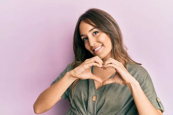 Young Brunette Woman Wearing Casual Clothes Smiling Love Doing Heart — Stock Photo, Image