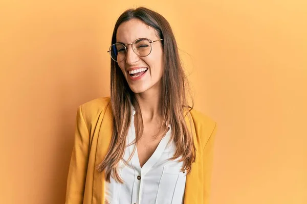Young Beautiful Woman Wearing Business Style Glasses Winking Looking Camera — Stock Photo, Image