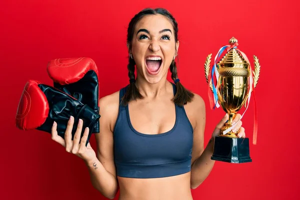 Young Brunette Girl Holding Boxer Gloves Trophy Angry Mad Screaming — 图库照片