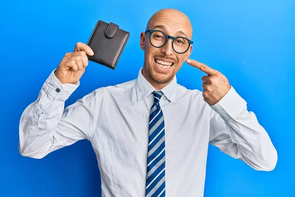 Bald Man Beard Holding Leather Wallet Smiling Happy Pointing Hand — Stock Photo, Image