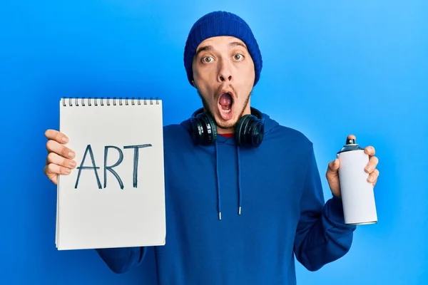 Hispanic Young Man Wearing Sweatshirt Holding Graffiti Spray Afraid Shocked — Stock Photo, Image