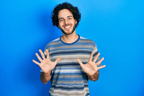 Handsome Hispanic Man Wearing Casual Clothes Pink Background Showing Pointing — 스톡 사진