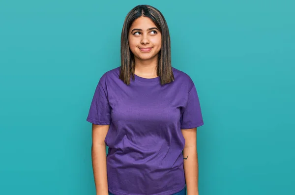 Young Hispanic Girl Wearing Casual Purple Shirt Smiling Looking Side — Stock Photo, Image