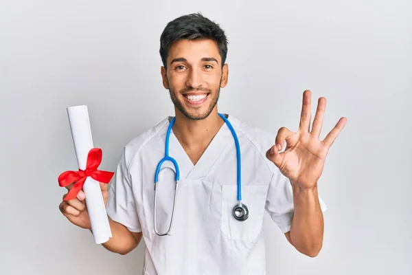 Young Handsome Man Wearing Doctor Uniform Holding Medical Degree Doing — 스톡 사진