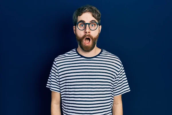 Caucasian Man Beard Wearing Striped Shirt Glasses Afraid Shocked Surprise — 스톡 사진