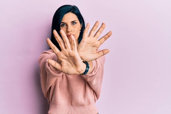 Young caucasian woman wearing casual clothes rejection expression crossing arms and palms doing negative sign, angry face 
