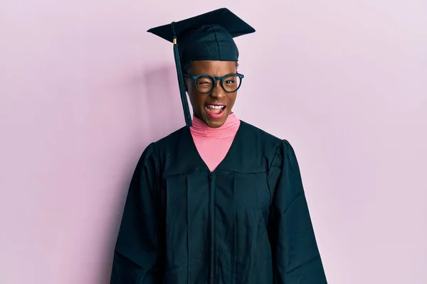 Young African American Girl Wearing Graduation Cap Ceremony Robe Winking — Stock Photo, Image