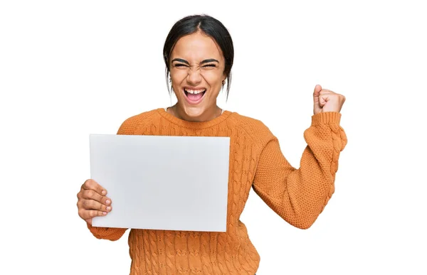 Young Brunette Woman Holding Blank Empty Banner Screaming Proud Celebrating — Stock Photo, Image