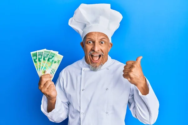 Middle Age Grey Haired Man Wearing Professional Cook Uniform Holding — Stock Photo, Image