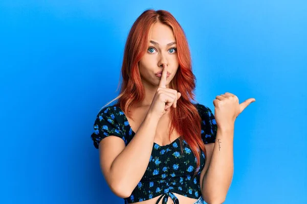Young Beautiful Redhead Woman Wearing Casual Clothes Blue Background Asking — Stock Photo, Image