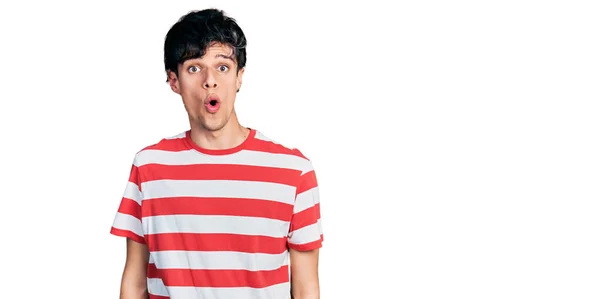 Handsome Hipster Young Man Wearing Casual Striped Shirt Afraid Shocked — Stock Photo, Image