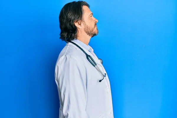 Middle Age Handsome Man Wearing Doctor Uniform Stethoscope Looking Side — Stock Photo, Image