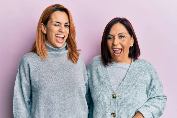 Latin Mother Daughter Wearing Casual Clothes Winking Looking Camera Sexy — Stock Photo, Image