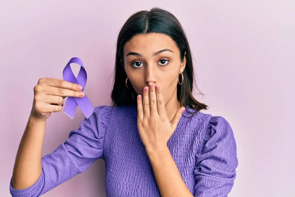 Young Hispanic Woman Holding Purple Ribbon Awareness Covering Mouth Hand — Stock Photo, Image