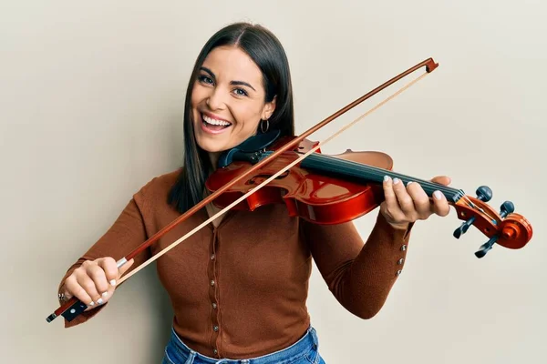 Young Brunette Woman Playing Violin Smiling Laughing Hard Out Loud — Stock Photo, Image