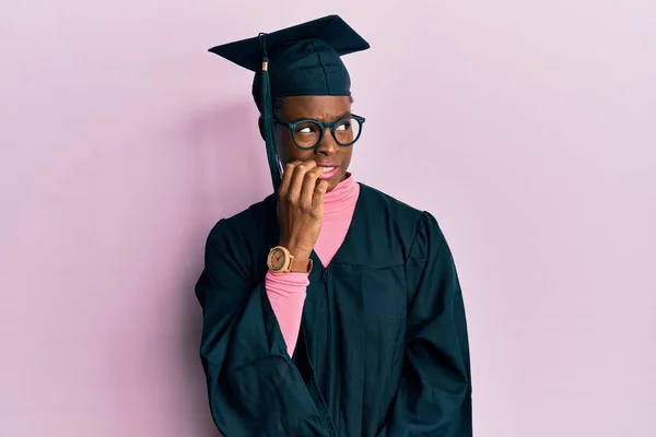 Young African American Girl Wearing Graduation Cap Ceremony Robe Looking — Stock Photo, Image