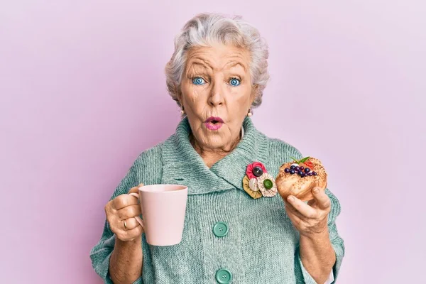 Senior Grey Haired Woman Drinking Cup Coffee Eating Bun Shock — Stock Photo, Image