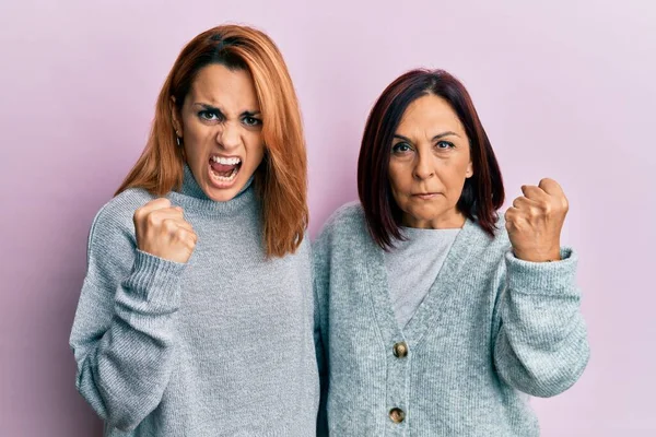 Latin Mother Daughter Wearing Casual Clothes Angry Mad Raising Fist — Stock Photo, Image