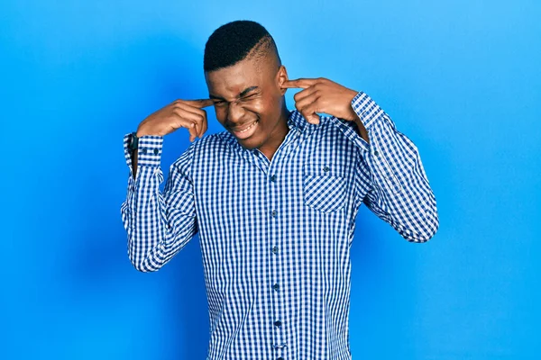 Young African American Man Wearing Casual Clothes Covering Ears Fingers — Stock Photo, Image