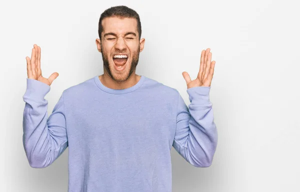Young Caucasian Man Wearing Casual Clothes Celebrating Mad Crazy Success — Stock Photo, Image