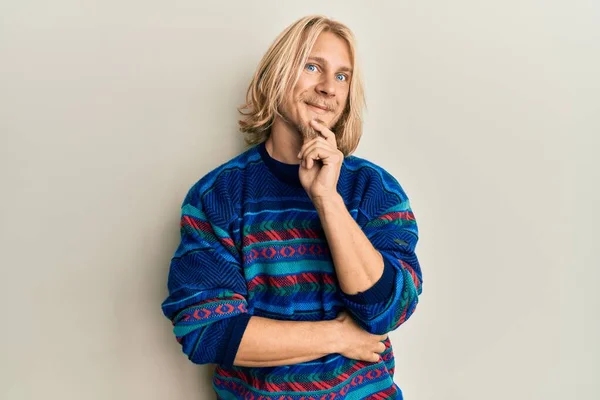 Caucasian Young Man Long Hair Wearing Colorful Winter Sweater Smiling — Stock Photo, Image