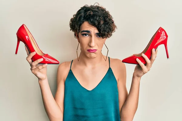 Young Man Wearing Woman Make Holding Elegant Red Heels Depressed — Stock Photo, Image