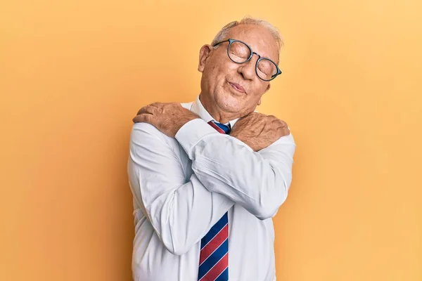 Senior Caucasian Man Wearing Business Clothes Hugging Oneself Happy Positive — Stock Photo, Image