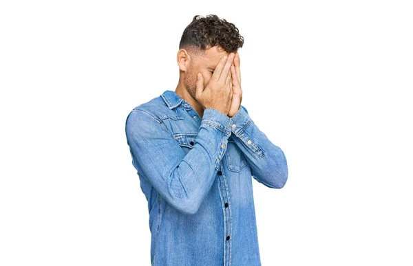 Young Hispanic Man Wearing Casual Denim Jacket Sad Expression Covering — Stock Photo, Image