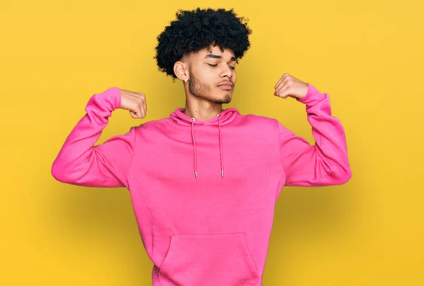 Young African American Man Afro Hair Wearing Casual Pink Sweatshirt — Stock Photo, Image