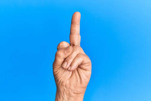 Hand Senior Hispanic Man Blue Isolated Background Showing Provocative Rude — Fotografia de Stock