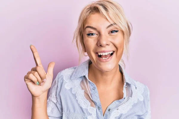 Young Blonde Girl Wearing Casual Clothes Pointing Finger Successful Idea — Stock Photo, Image