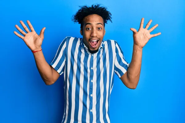 Young African American Man Beard Wearing Casual Striped Shirt Celebrating — Stock Photo, Image