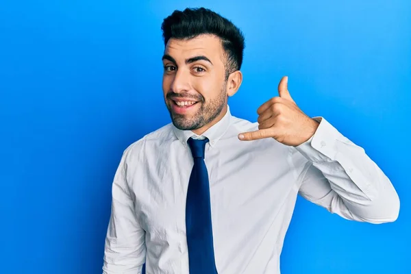 Young Hispanic Man Wearing Business Clothes Smiling Doing Phone Gesture — Stock Photo, Image