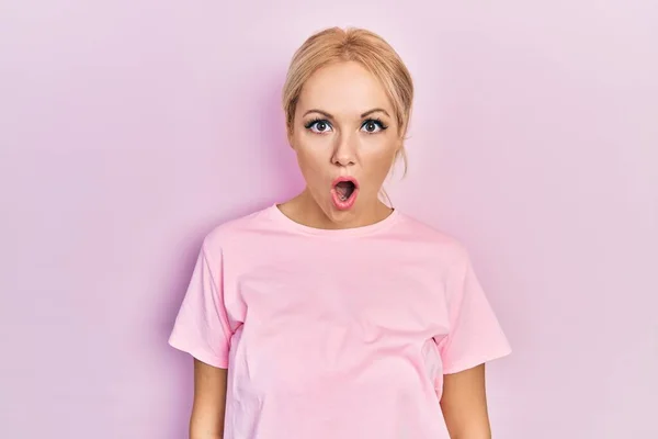 Young Blonde Woman Wearing Casual Pink Shirt Afraid Shocked Surprise — Stock Photo, Image