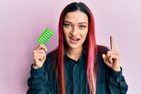 Young Caucasian Woman Holding Birth Control Pills Smiling Idea Question — Stock Photo, Image