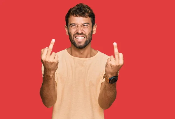 Handsome Young Man Beard Wearing Casual Tshirt Showing Middle Finger — Stockfoto