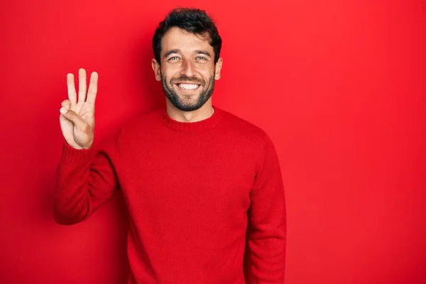 Schöner Mann Mit Bart Trägt Lässig Roten Pullover Und Zeigt — Stockfoto