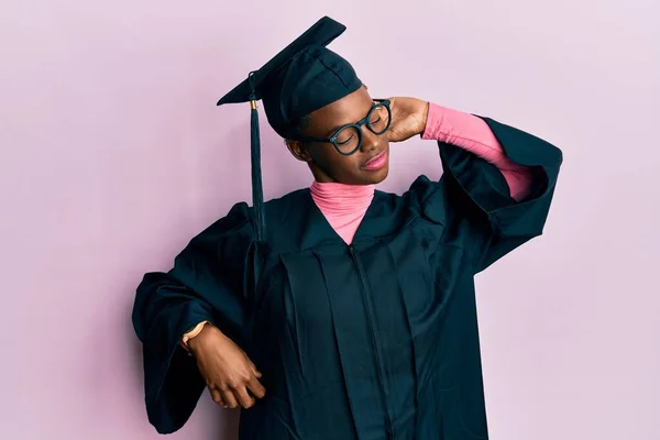 Young African American Girl Wearing Graduation Cap Ceremony Robe Stretching — Stock Photo, Image