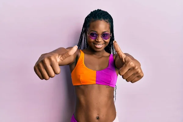 Young African American Woman Wearing Bikini Sunglasses Approving Doing Positive — Stock Photo, Image
