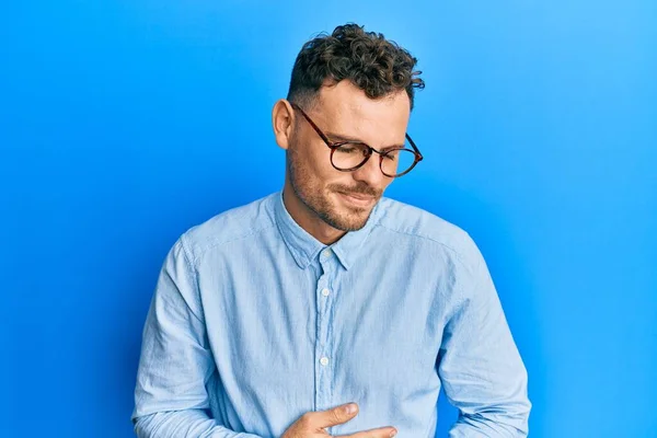 Joven Hombre Hispano Usando Ropa Casual Gafas Con Mano Estómago —  Fotos de Stock