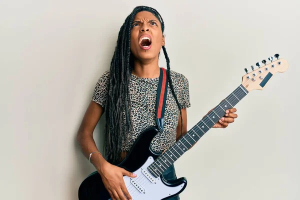 African American Woman Playing Electric Guitar Angry Mad Screaming Frustrated — Stock Photo, Image