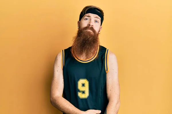 Redhead Man Long Beard Wearing Basketball Uniform Relaxed Serious Expression — Stock Photo, Image