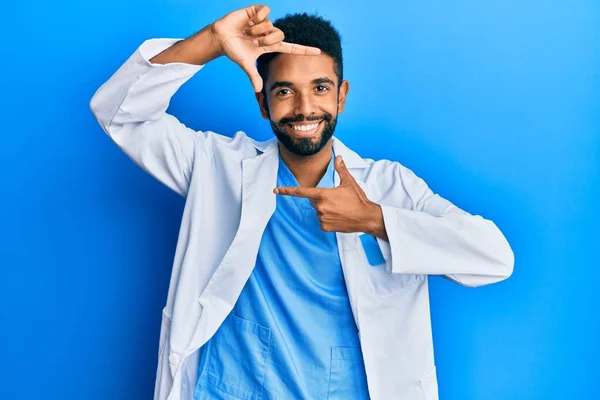 Handsome Hispanic Man Beard Wearing Doctor Uniform Smiling Making Frame — Stock Photo, Image