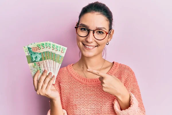 Young Caucasian Woman Holding Hong Kong Dollars Banknotes Smiling Happy — Stock Photo, Image