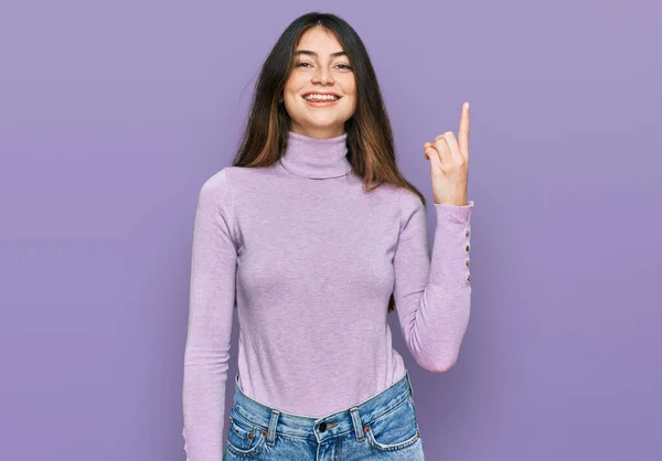 Young Beautiful Teen Girl Wearing Turtleneck Sweater Showing Pointing Finger — Stock Photo, Image