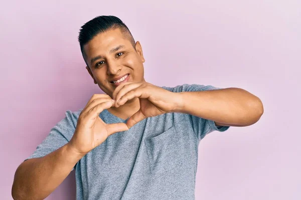 Young Latin Man Wearing Casual Clothes Smiling Love Doing Heart — Stock Photo, Image