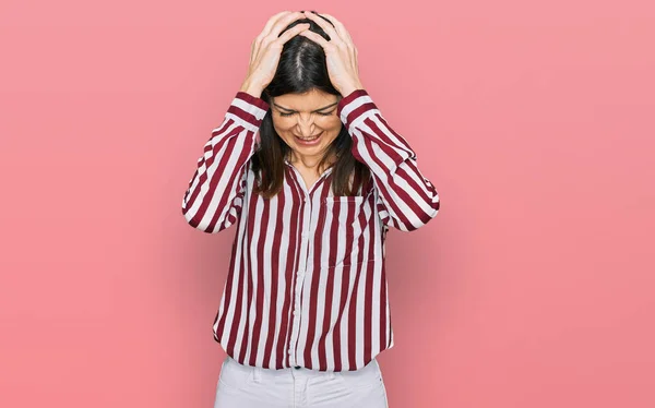 Beautiful Brunette Woman Wearing Striped Shirt Suffering Headache Desperate Stressed — Stock Photo, Image