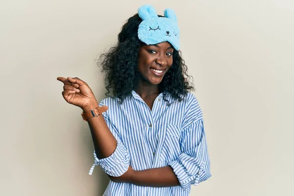 Beautiful African Young Woman Wearing Sleep Mask Pajama Smiling Happy — Stock Photo, Image